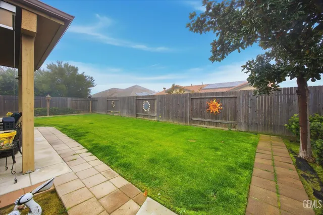 a view of a backyard with a garden