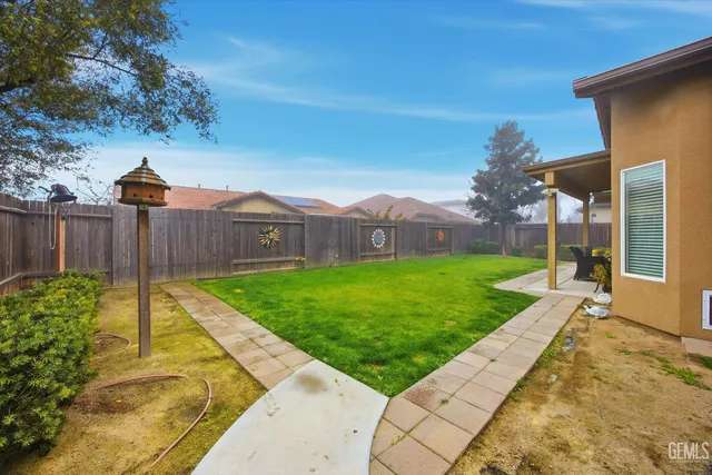 a view of a garden with a slide