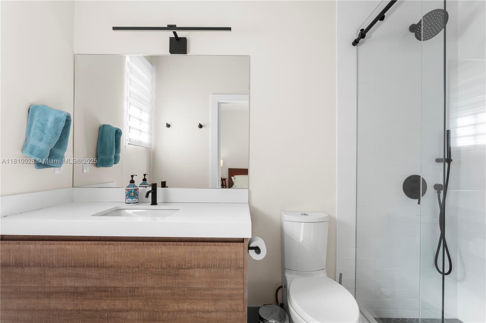 146 Dockside Circle Weston, FL 33327 - Photo 19 of 34 a bathroom with a granite countertop sink toilet and shower