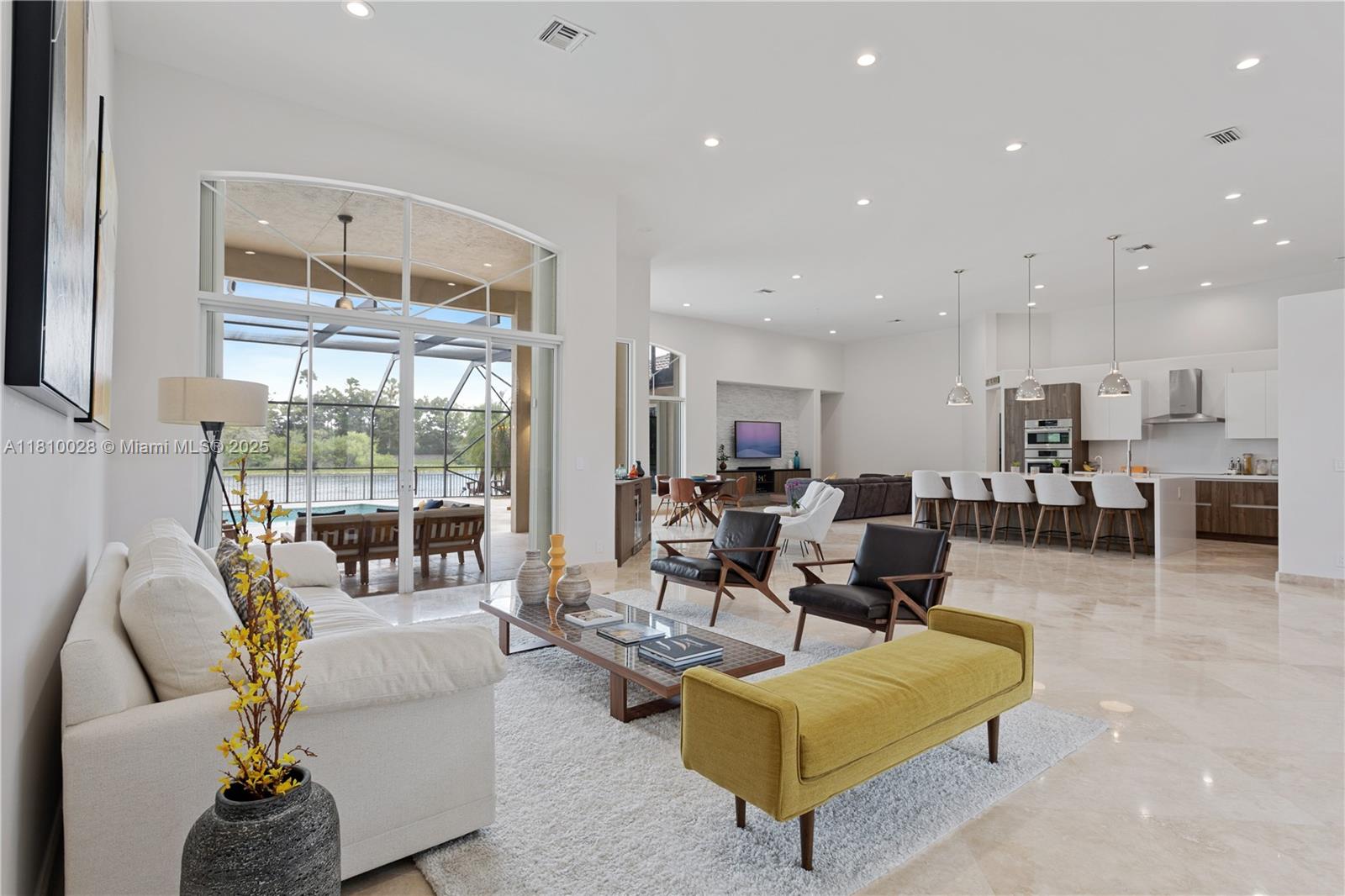 146 Dockside Circle Weston, FL 33327 - Photo 2 of 34 a living room with furniture and a large window