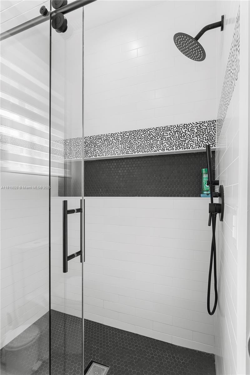 146 Dockside Circle Weston, FL 33327 - Photo 25 of 34 a bathroom with a shower and a shower