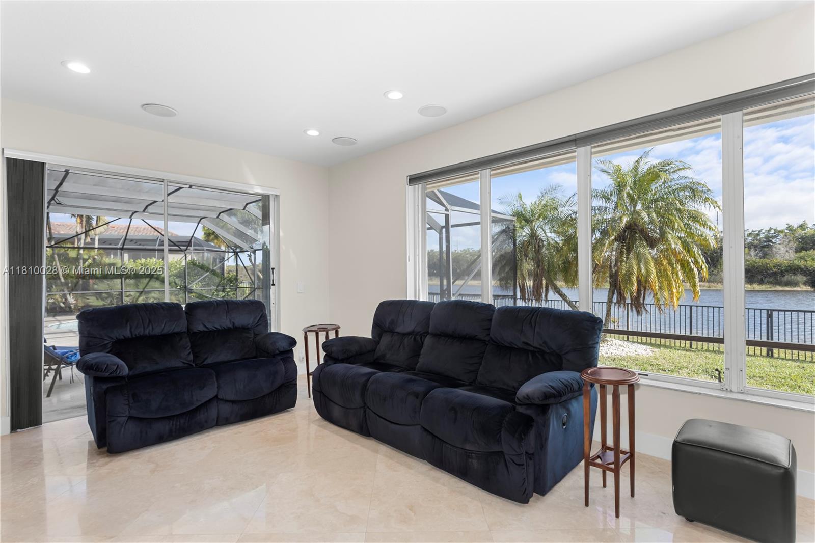 146 Dockside Circle Weston, FL 33327 - Photo 27 of 34 a living room with furniture and a large window