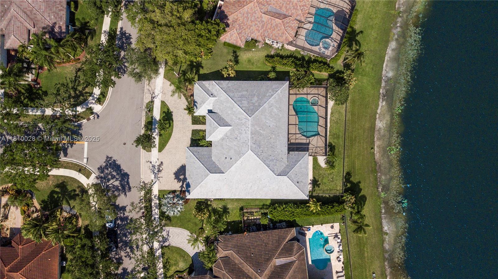 146 Dockside Circle Weston, FL 33327 - Photo 30 of 34 an aerial view of a house with a yard and garden