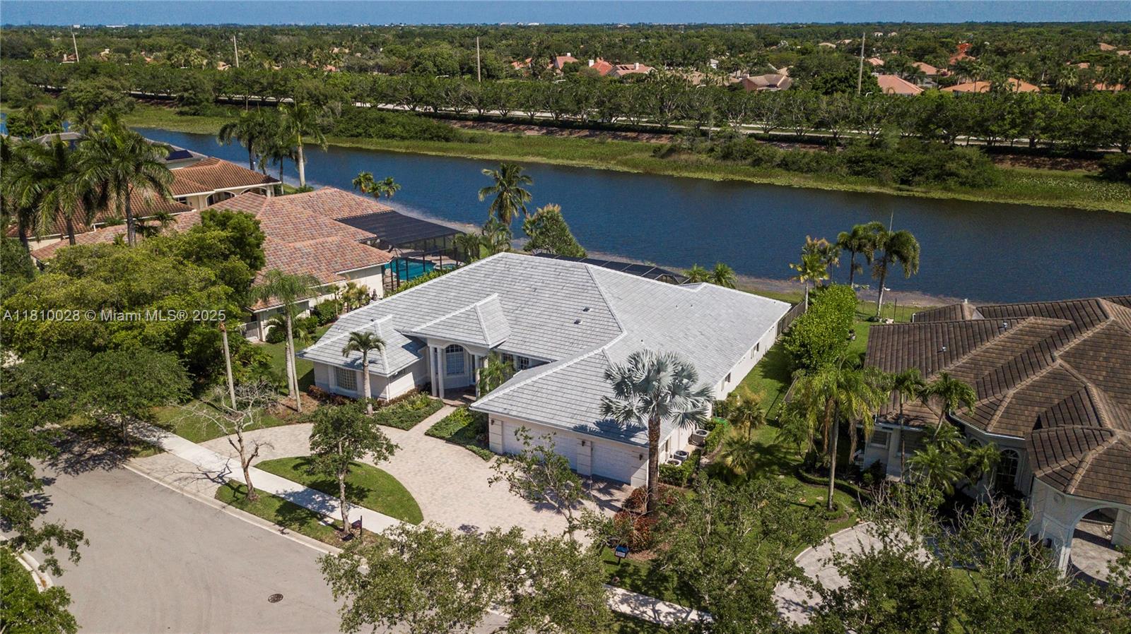 146 Dockside Circle Weston, FL 33327 - Photo 32 of 34 an aerial view of a house with a lake view