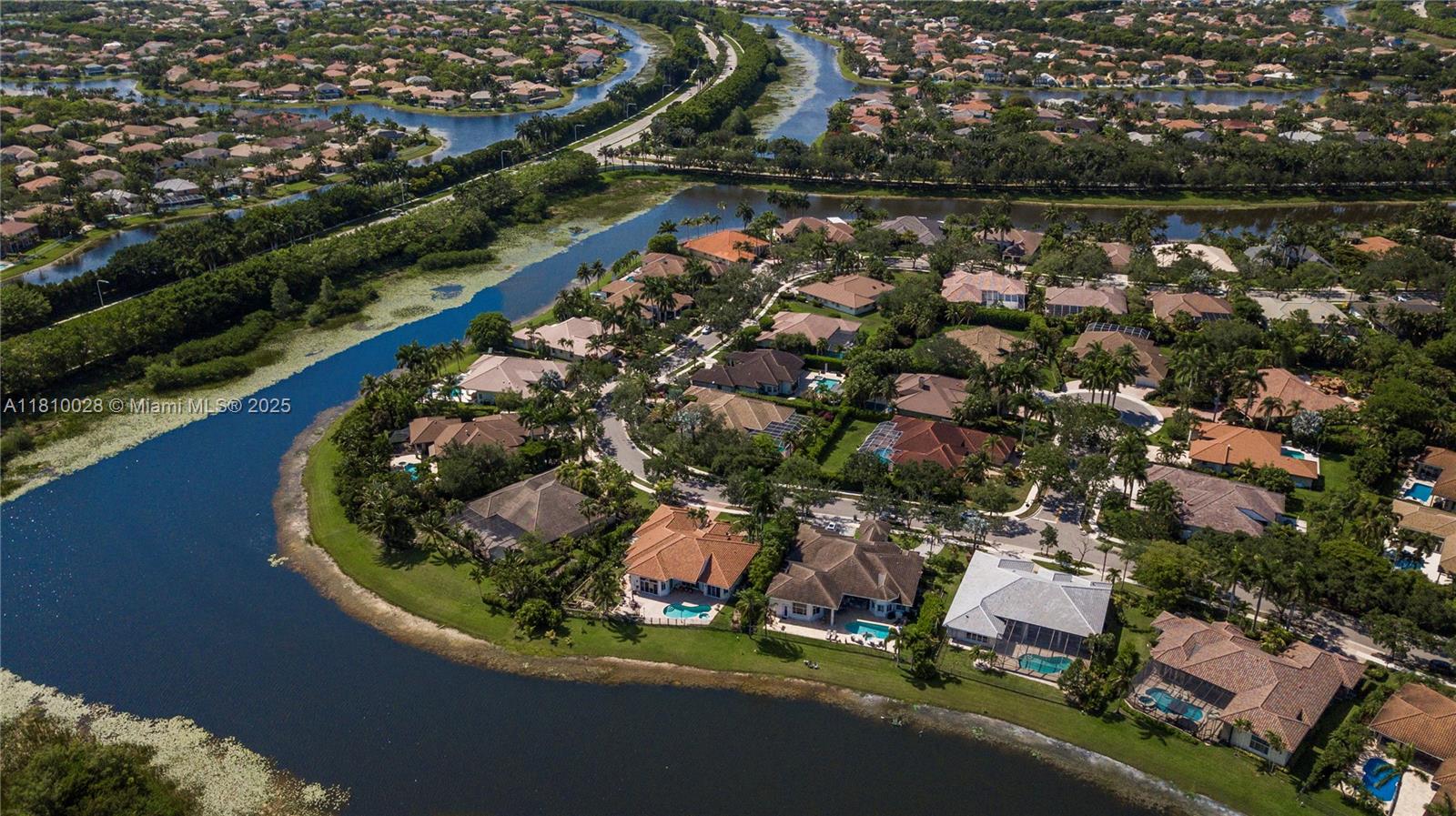 146 Dockside Circle Weston, FL 33327 - Photo 34 of 34 an aerial view of a house with a lake view