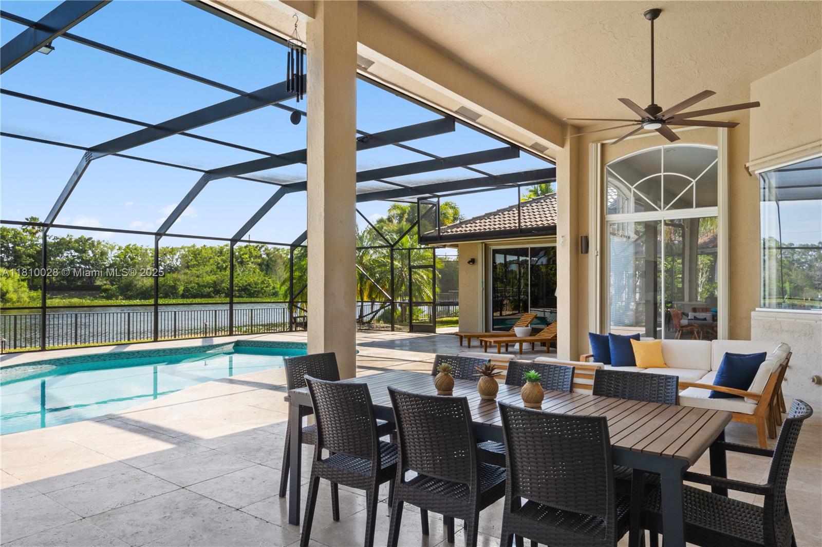 146 Dockside Circle Weston, FL 33327 - Photo 10 of 34 a view of a dining room with furniture window and outside view