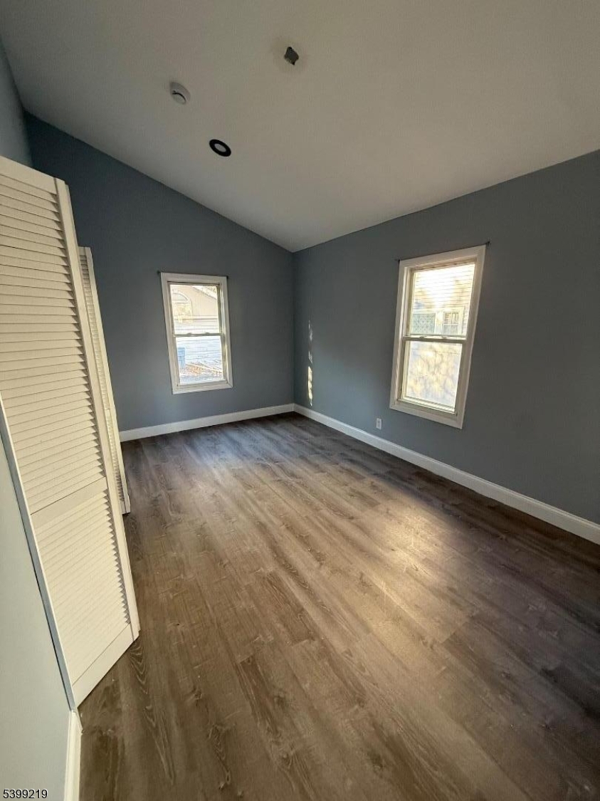 704 Park Avenue Elizabeth, NJ 07208 - Photo 8 of 15 a view of an empty room and window