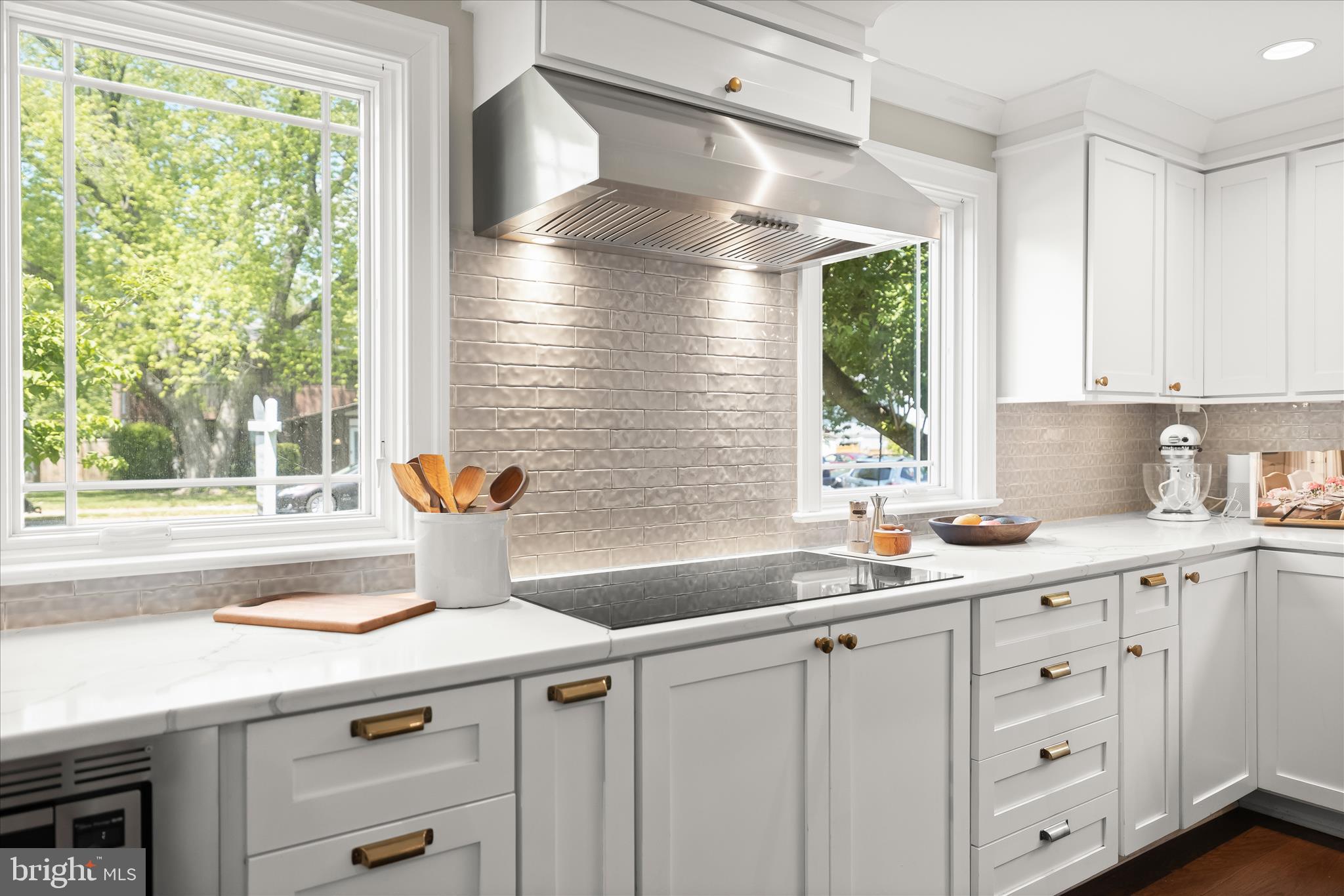 6366 11th Road North Arlington, VA 22205 - Photo 4 of 39 a kitchen with a sink and large window