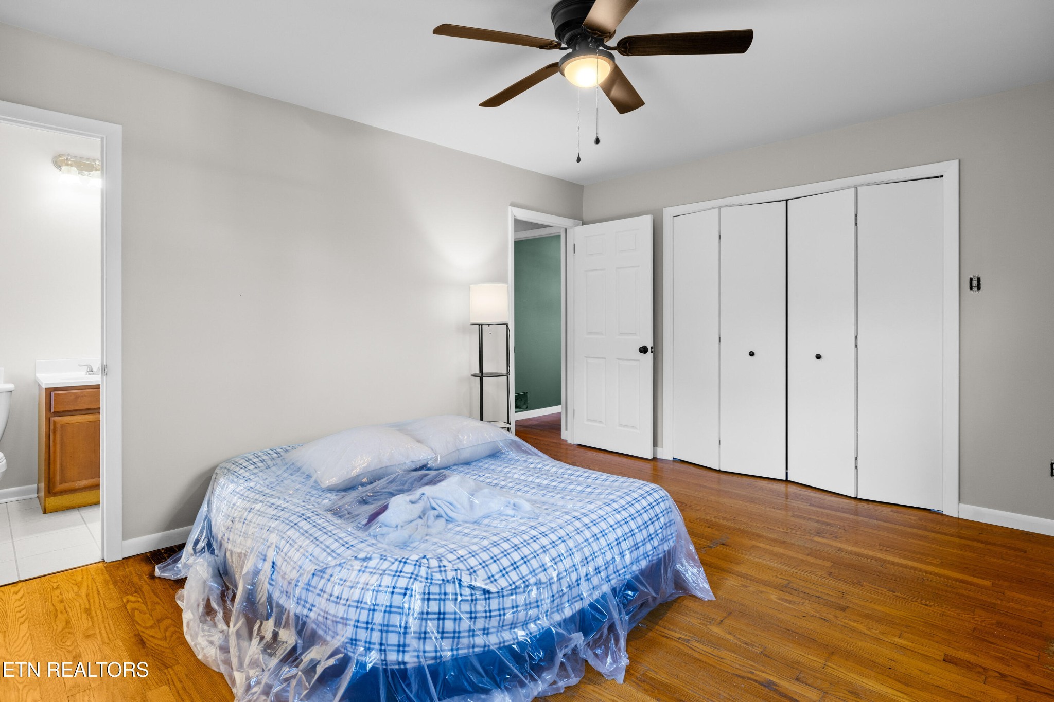 406 Overhill Road Knoxville, TN 37914 - Photo 13 of 24 a bedroom with a bed and a chandelier