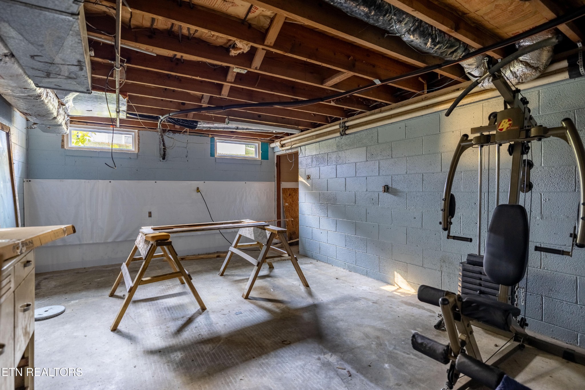406 Overhill Road Knoxville, TN 37914 - Photo 18 of 24 a view of a room with gym equipment