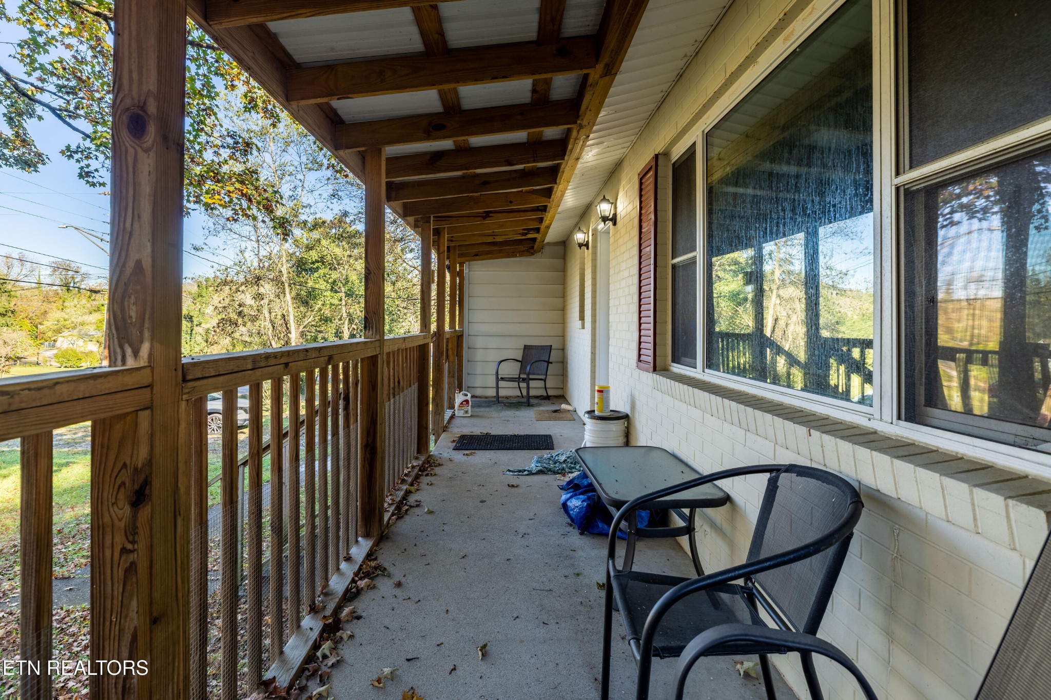 406 Overhill Road Knoxville, TN 37914 - Photo 21 of 24 a view of a porch with furniture and a yard