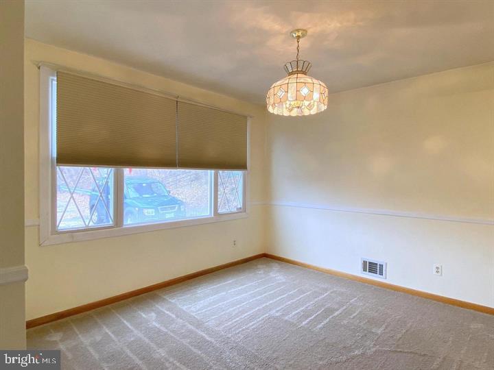 3300 Upton Road Baltimore, MD 21234 - Photo 17 of 40 a view of an empty room with a window