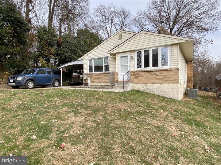 3300 Upton Road Baltimore, MD 21234 - Photo 2 of 40 a view of a house with a yard and sitting area