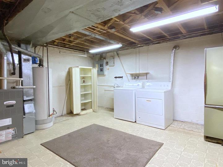 3300 Upton Road Baltimore, MD 21234 - Photo 36 of 40 a kitchen with a sink and refrigerator