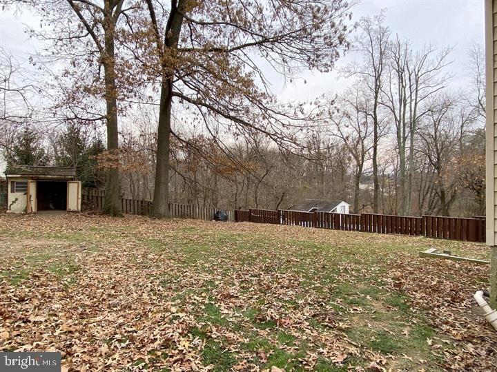3300 Upton Road Baltimore, MD 21234 - Photo 37 of 40 a backyard of a house with lots of green space