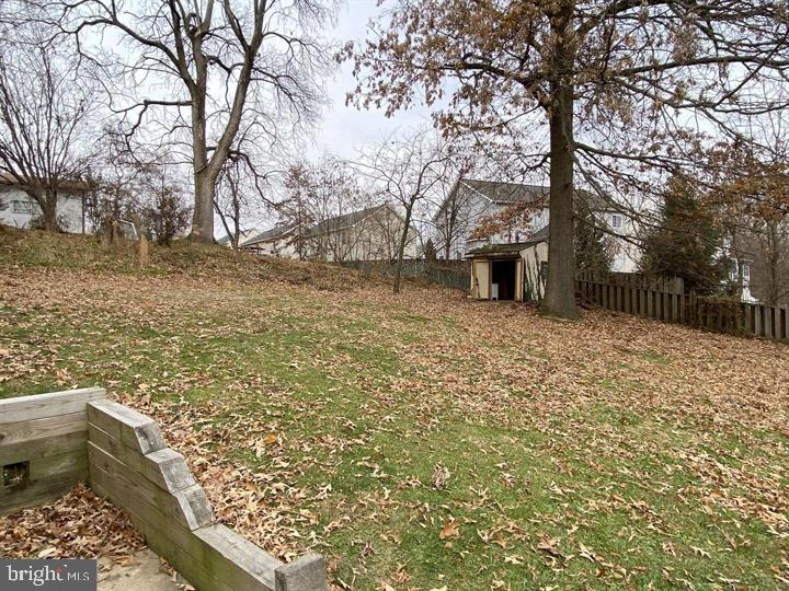 3300 Upton Road Baltimore, MD 21234 - Photo 40 of 40 a view of a backyard with wooden fence and large trees