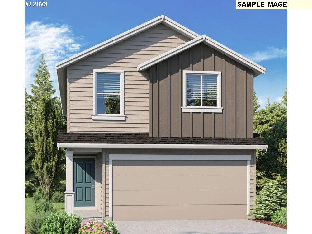 1006 Northwest 175th Way Ridgefield, WA 98642 - Photo 1 of 27 a view of house with yard and tree in the background