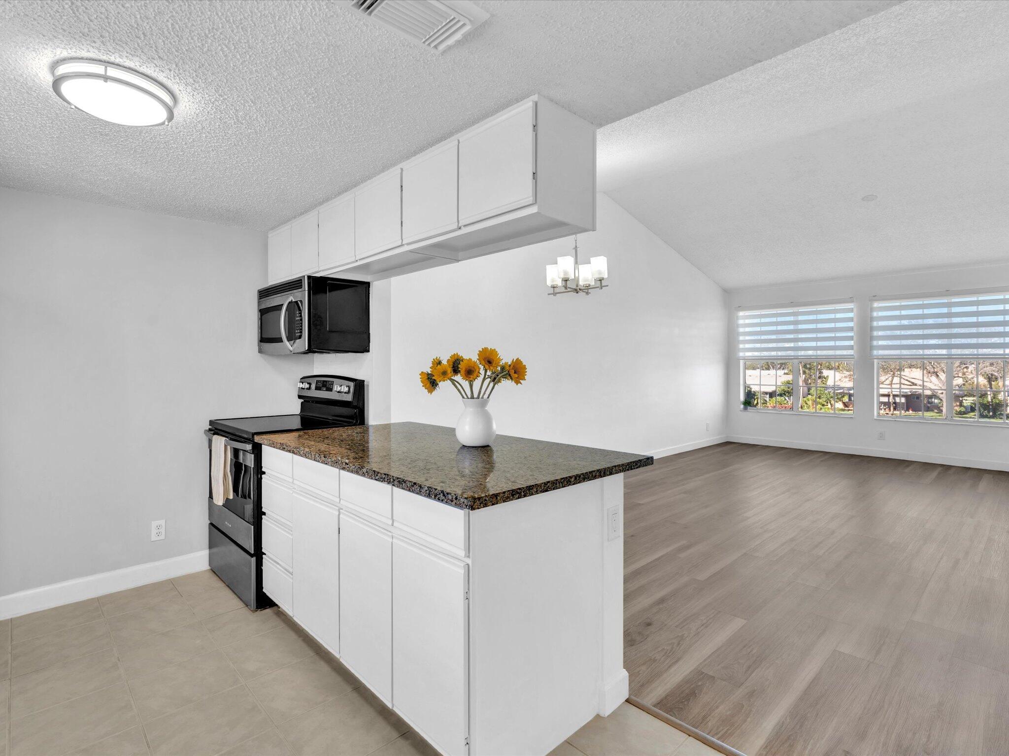 6284 La Costa Drive, Unit K Boca Raton, FL 33433 - Photo 6 of 57 Open Living Space