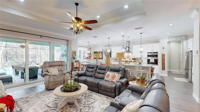 a kitchen with stainless steel appliances a refrigerator and a sink