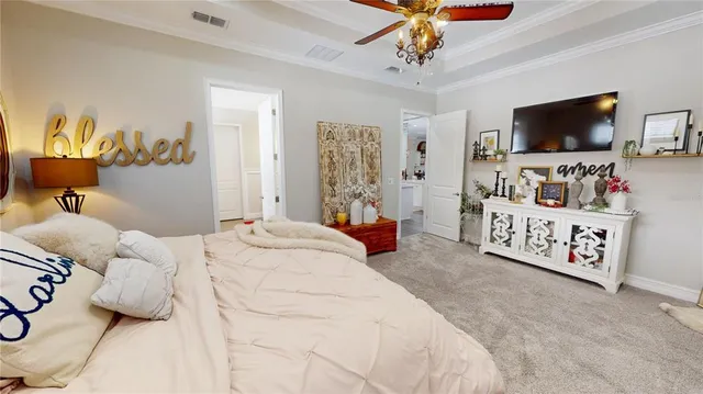 a bathroom with double vanity sinks and a mirror