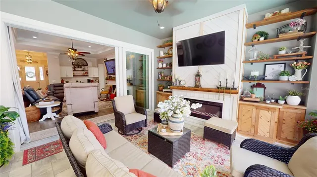 a view of a swimming pool with an outdoor seating