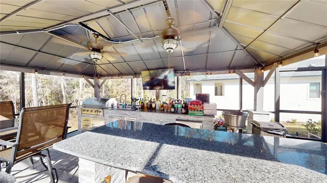 a view of a house with a yard porch and sitting area