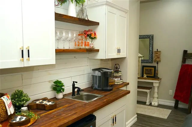 a living room with furniture fireplace and flat screen tv