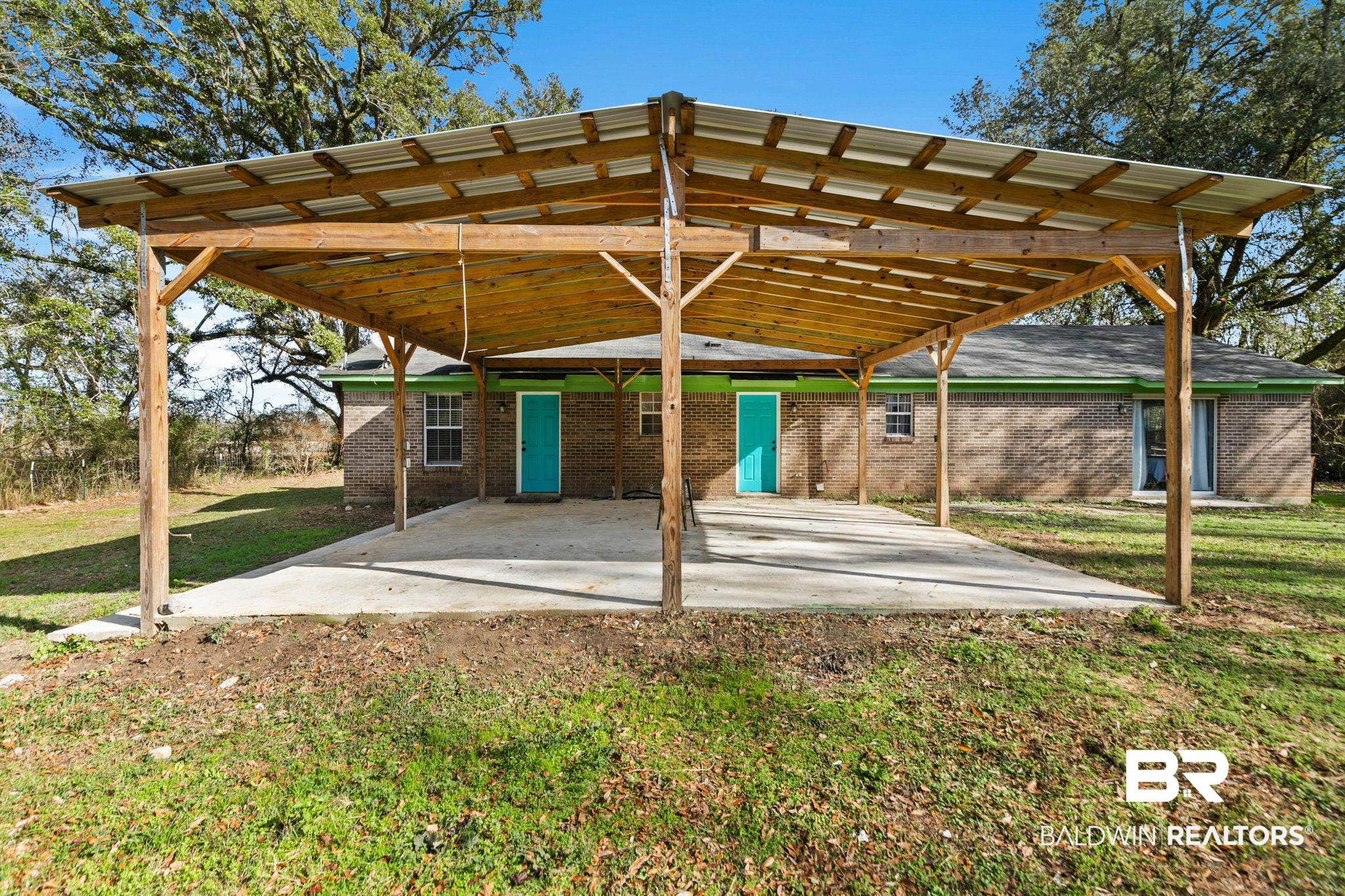 17366 Old Brady Road Bay Minette, AL 36507 - Photo 31 of 43 View of parking / parking lot featuring a detached carport