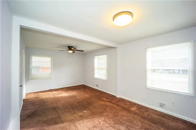 a view of a room with windows