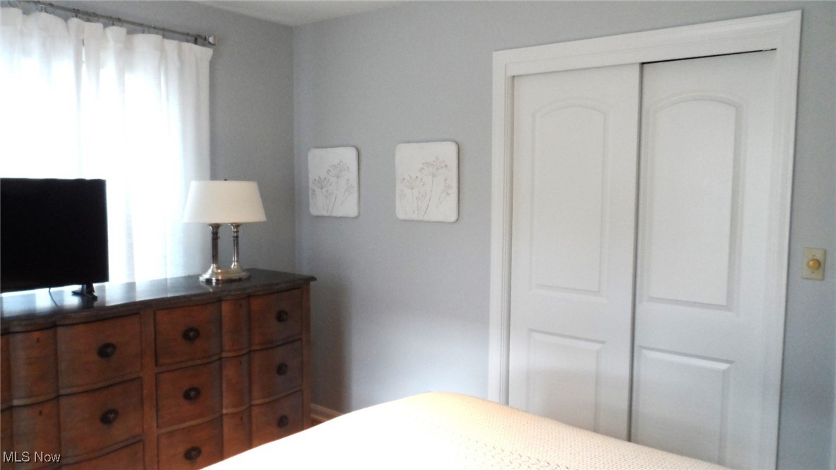 2542 Carson Road Fairlawn, OH 44333 - Photo 8 of 28 2nd Bedroom with multiple windows and a closet