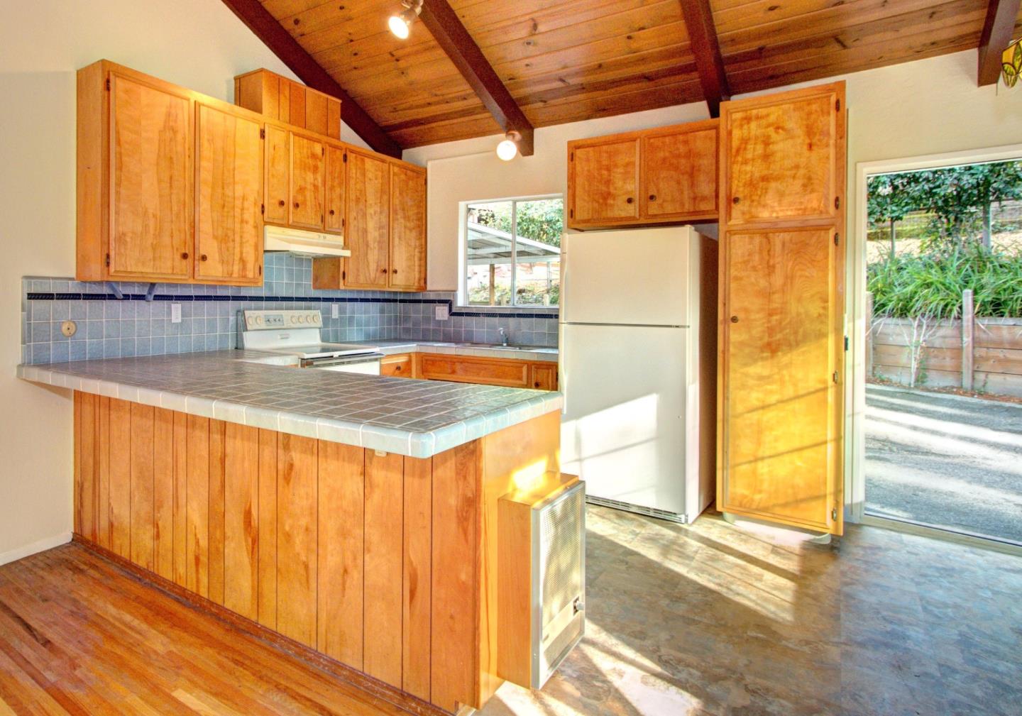 115 Estates Drive Ben Lomond, CA 95005 - Photo 3 of 13 a view of a bathroom with a sink and a window