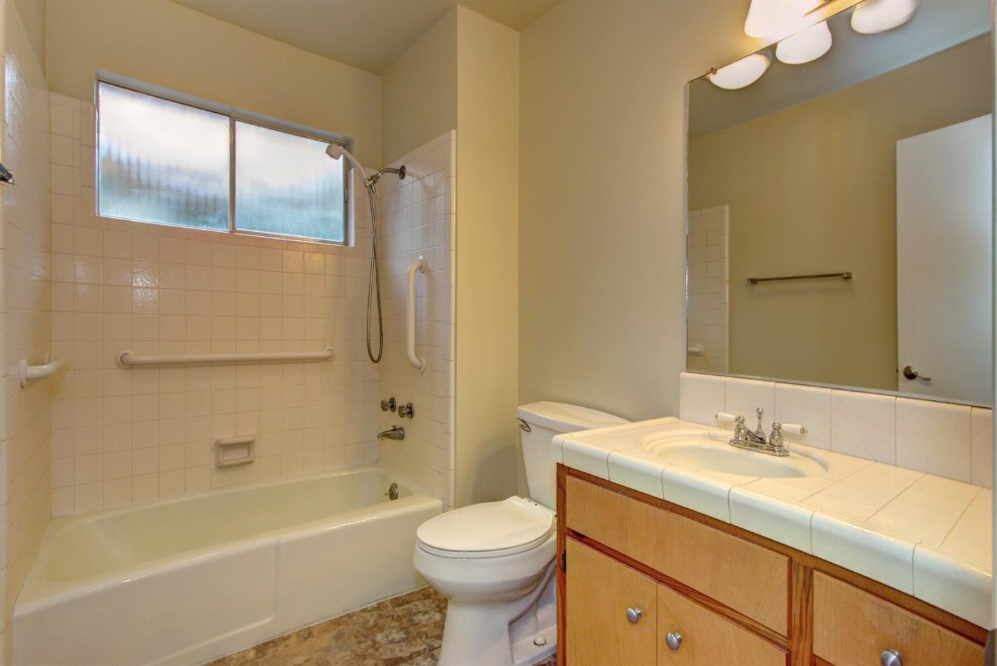 115 Estates Drive Ben Lomond, CA 95005 - Photo 9 of 13 a bathroom with a granite countertop sink toilet and shower
