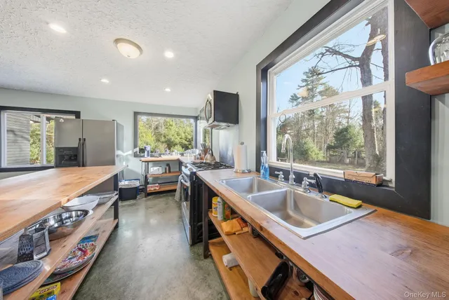a utility room with closet dryer and washer
