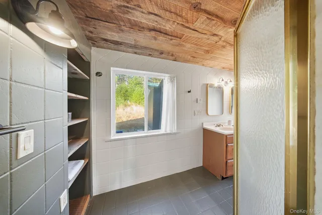 a house with trees in the background