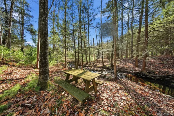 a view of a backyard of the house