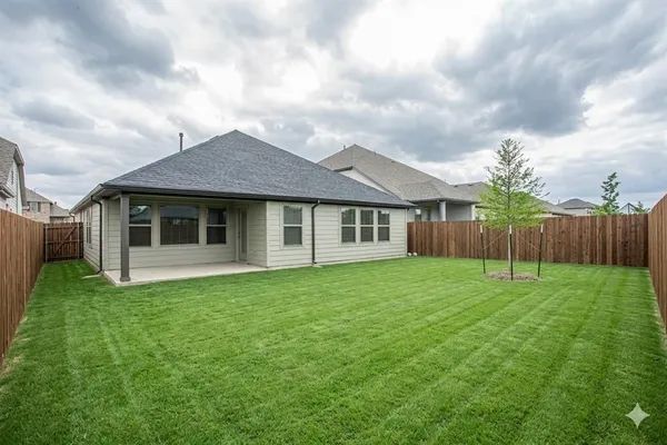a house view with a garden space
