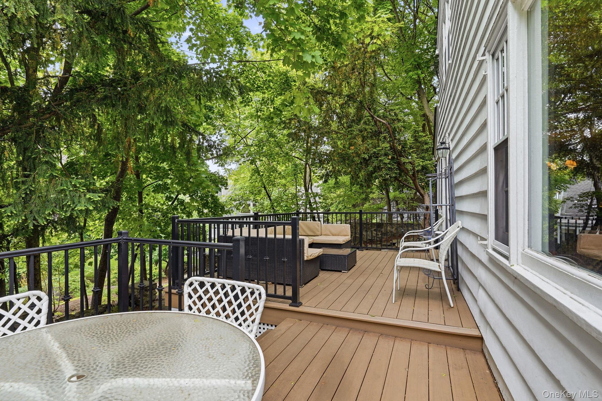 26 Cedarlawn Road Irvington, NY 10533 - Photo 26 of 34 a view of balcony with wooden floor and outdoor seating