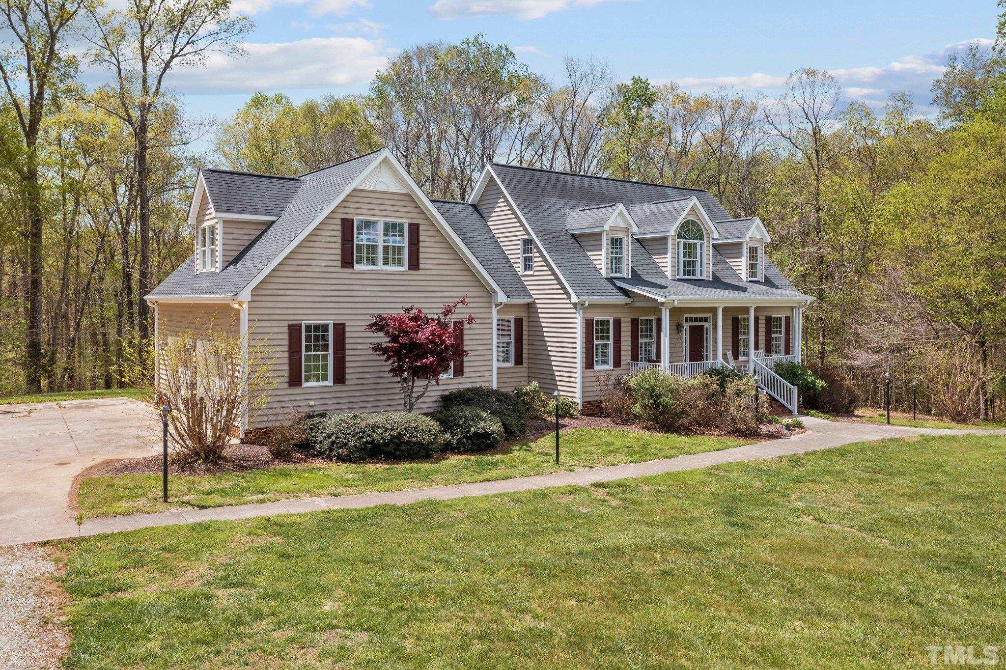 325 Onie Burton Road Rougemont, NC 27572 - Photo 29 of 39 a front view of a house with a yard
