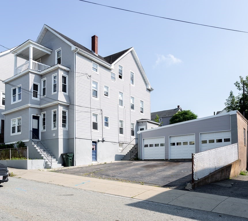 325 Hope Street Fall River, MA 02721 - Photo 2 of 34 a view of a building with a street