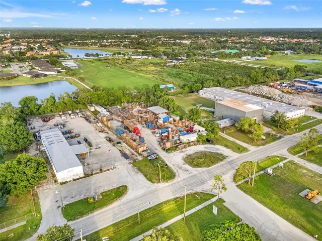 an aerial view of a house with outdoor space