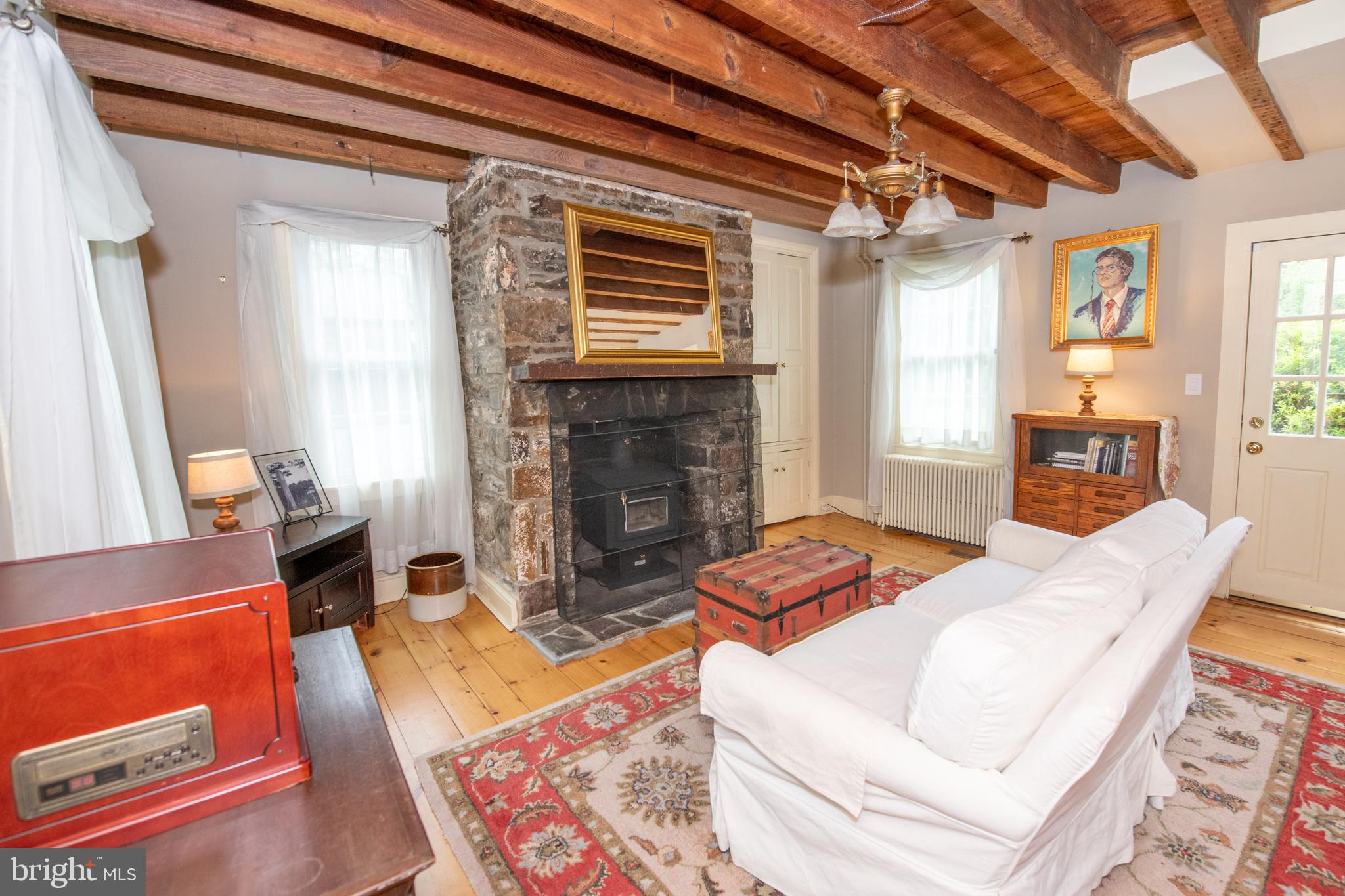 107 Stoopville Road Newtown, PA 18940 - Photo 14 of 60 a living room with fireplace furniture and a fireplace