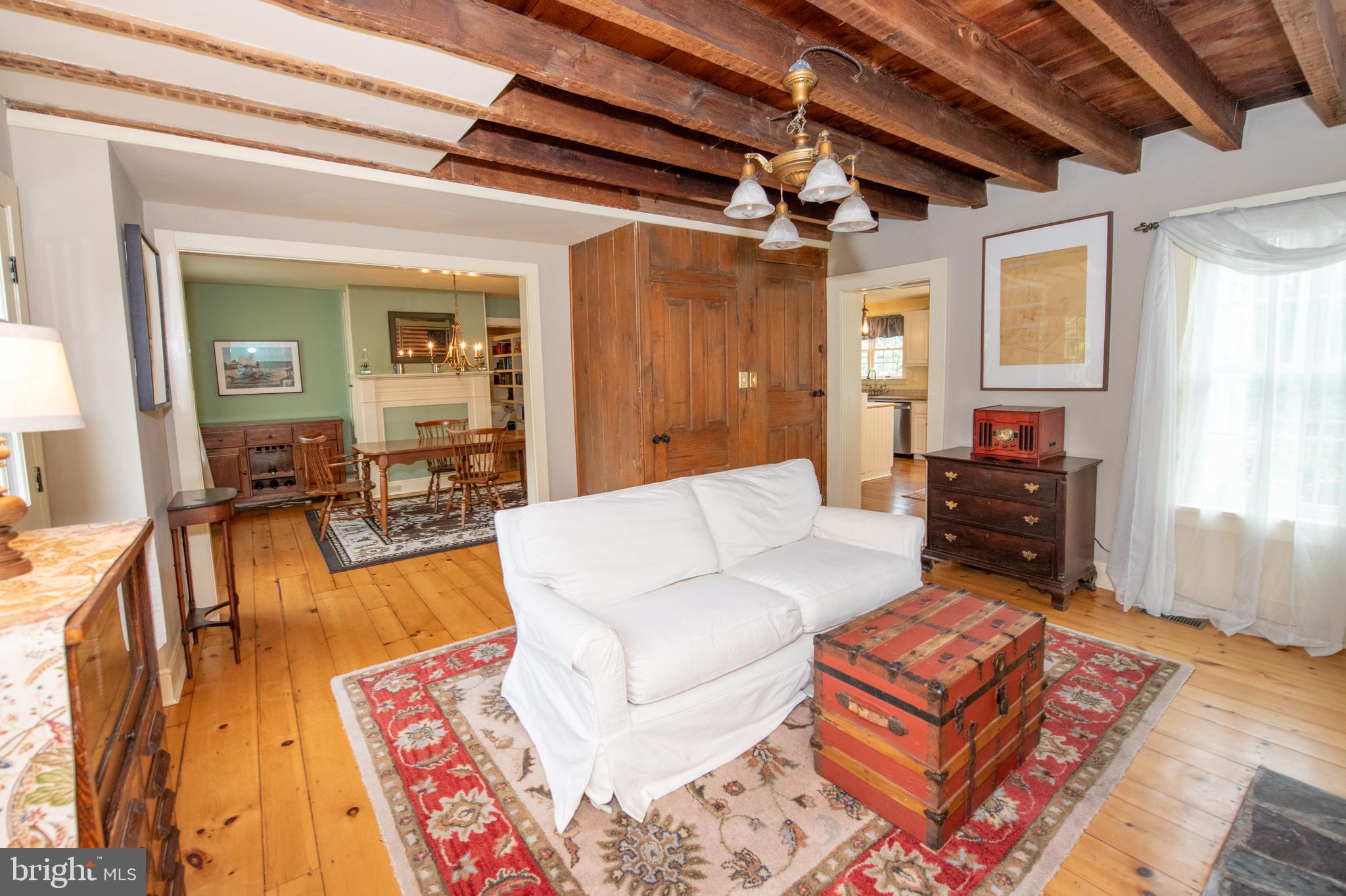107 Stoopville Road Newtown, PA 18940 - Photo 15 of 60 a living room with furniture and a dining table