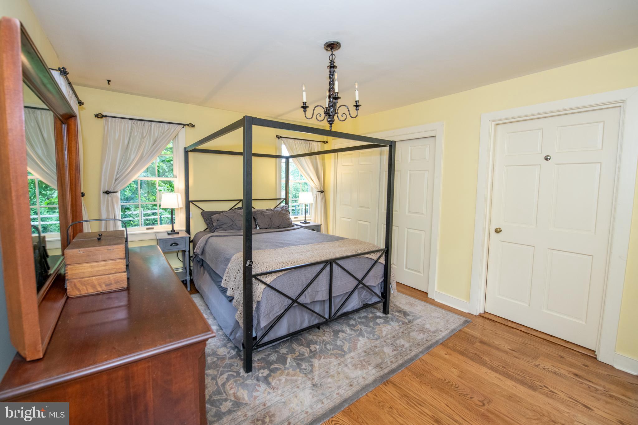 107 Stoopville Road Newtown, PA 18940 - Photo 23 of 60 a view of a dining room with furniture window and wooden floor
