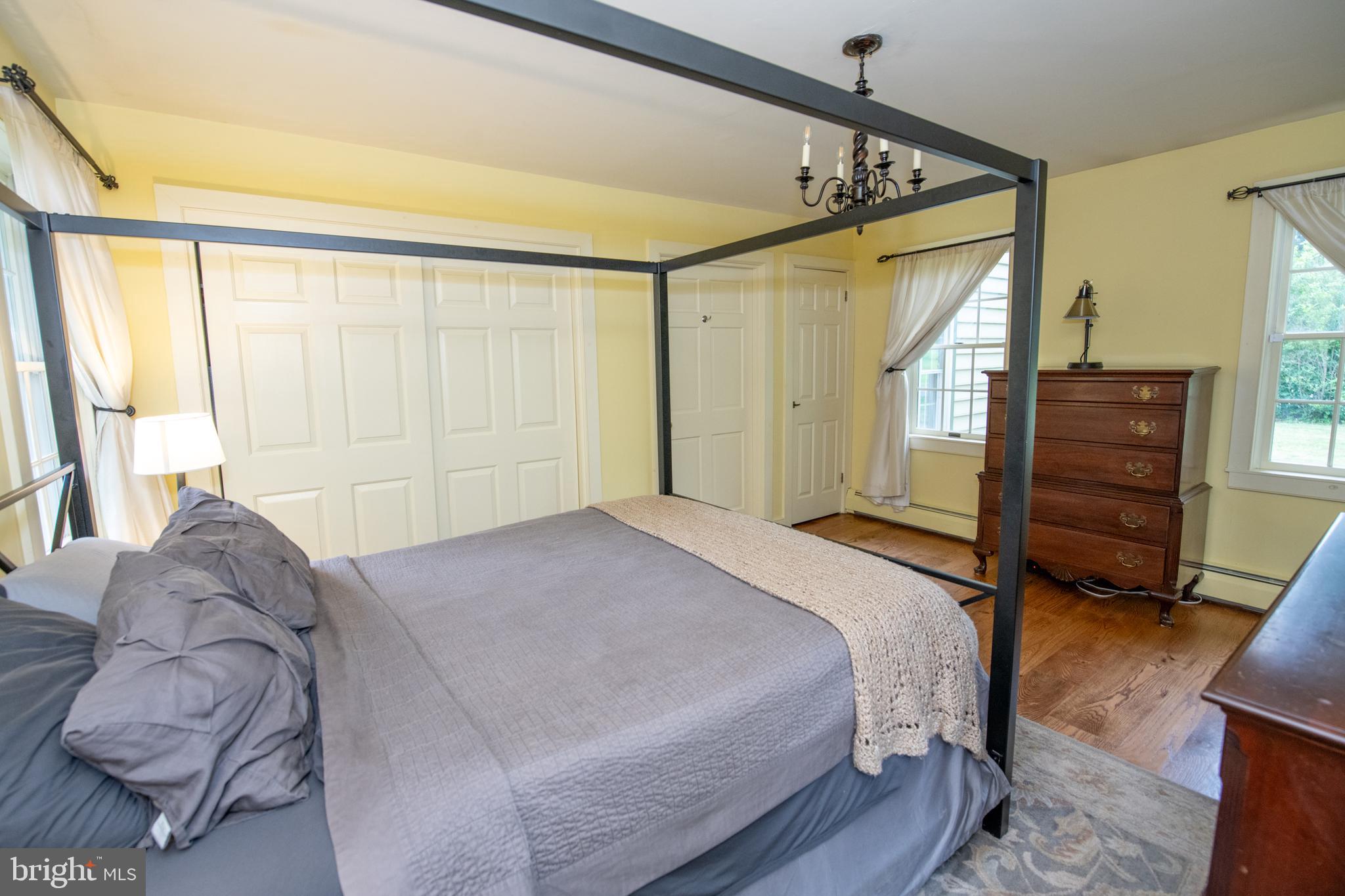 107 Stoopville Road Newtown, PA 18940 - Photo 24 of 60 a bedroom with a bed window and a dresser