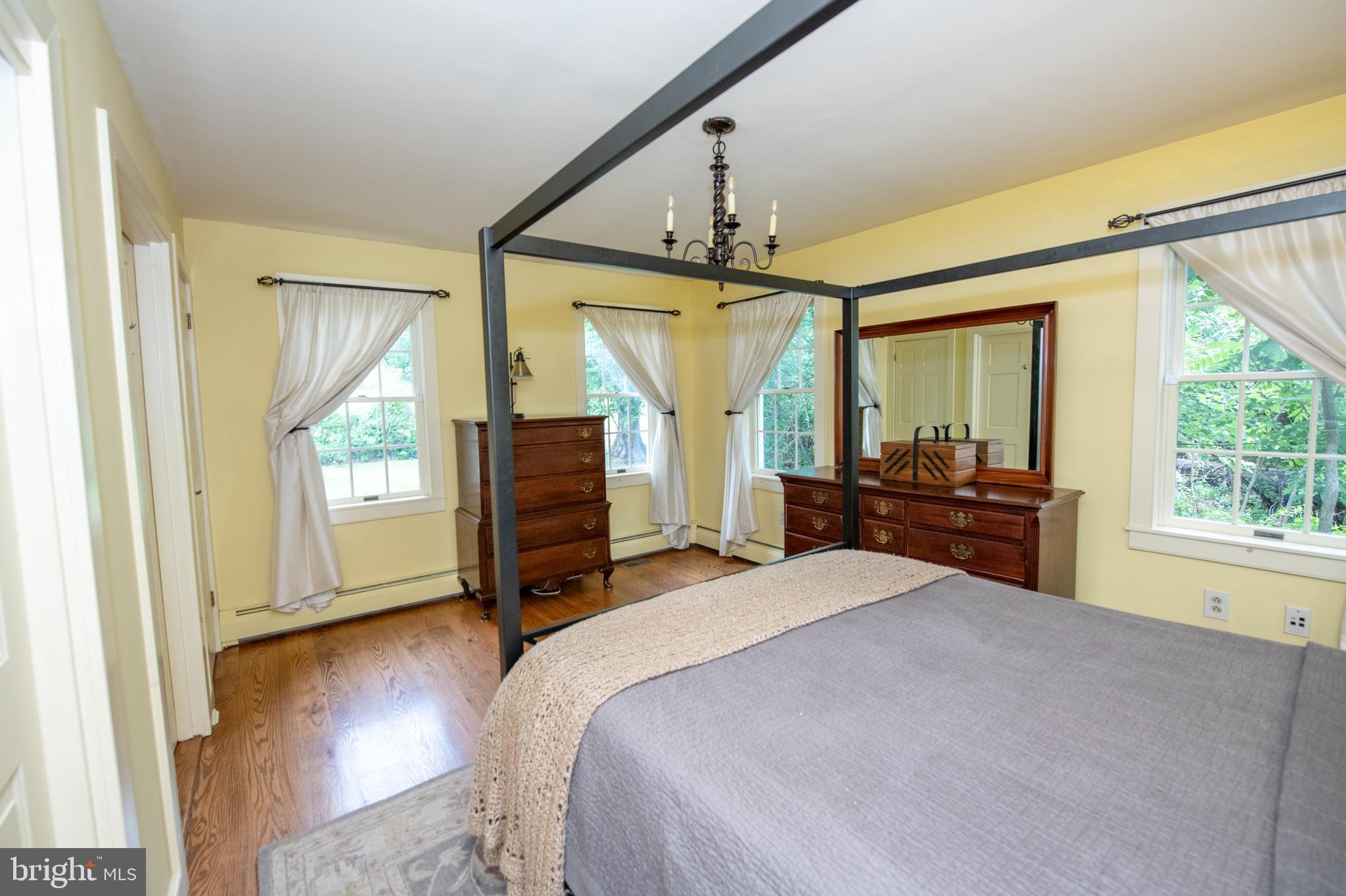 107 Stoopville Road Newtown, PA 18940 - Photo 25 of 60 a bedroom with a bed dresser and a large window