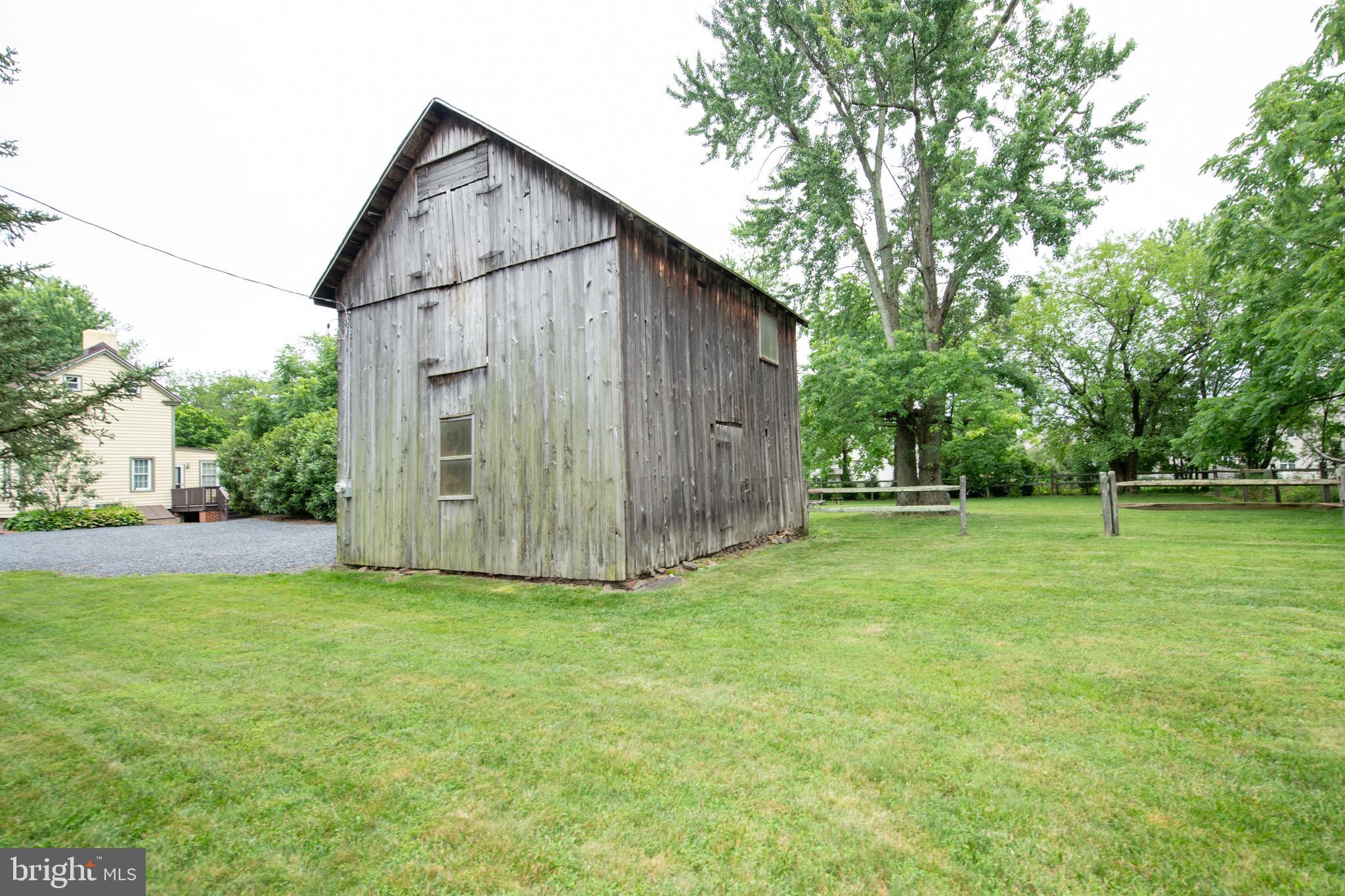107 Stoopville Road Newtown, PA 18940 - Photo 38 of 60 a view of backyard with garden and trees