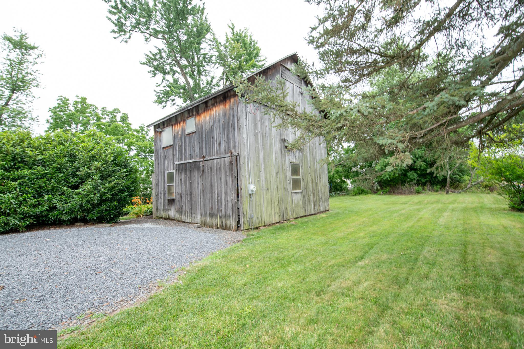 107 Stoopville Road Newtown, PA 18940 - Photo 40 of 60 a backyard of a house with lots of green space