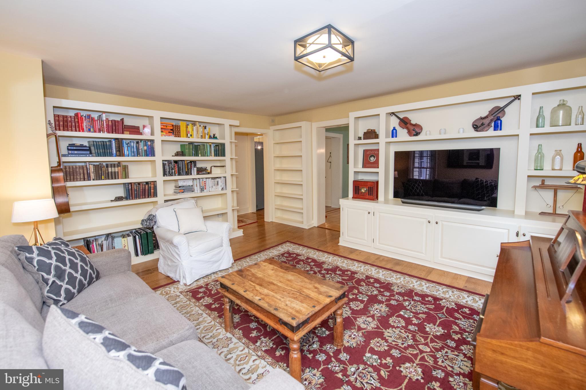 107 Stoopville Road Newtown, PA 18940 - Photo 5 of 60 a living room with furniture and a flat screen tv