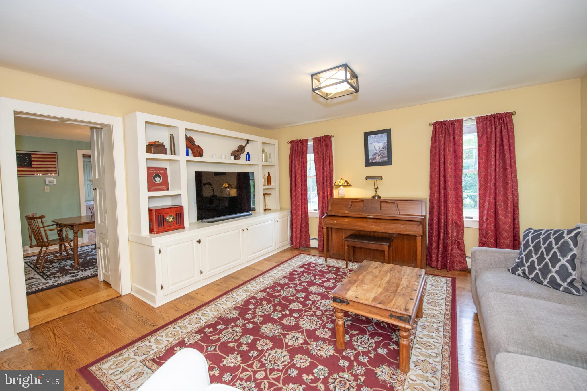 107 Stoopville Road Newtown, PA 18940 - Photo 6 of 60 a living room with furniture and a flat screen tv