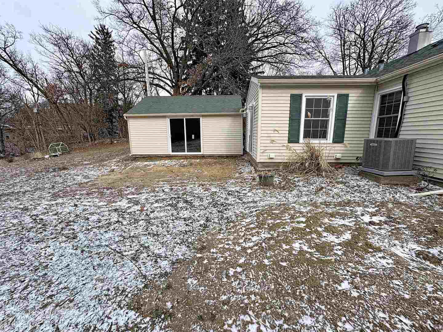 1213 29th Ave Court Moline, IL 61265 - Photo 17 of 17 a front view of a house with a yard